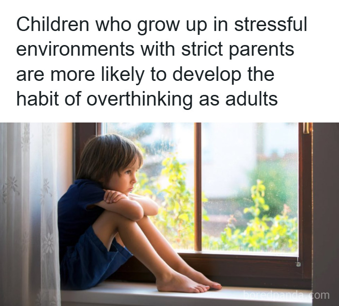 Child sitting thoughtfully by a window, illustrating a psychology fact about overthinking from stressful childhood environments.