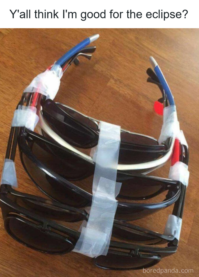Stack of sunglasses taped together in a creative solution to watch the eclipse, showcasing weirdest math problems solved.