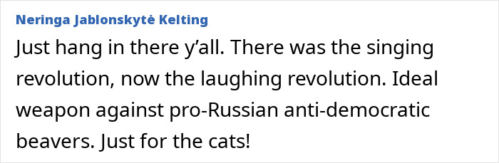 Text post by Neringa Jablonskytė Kelting about revolutions and cats as a weapon, highlighting Lithuania's lawmaker&rsquo;s cat consent.