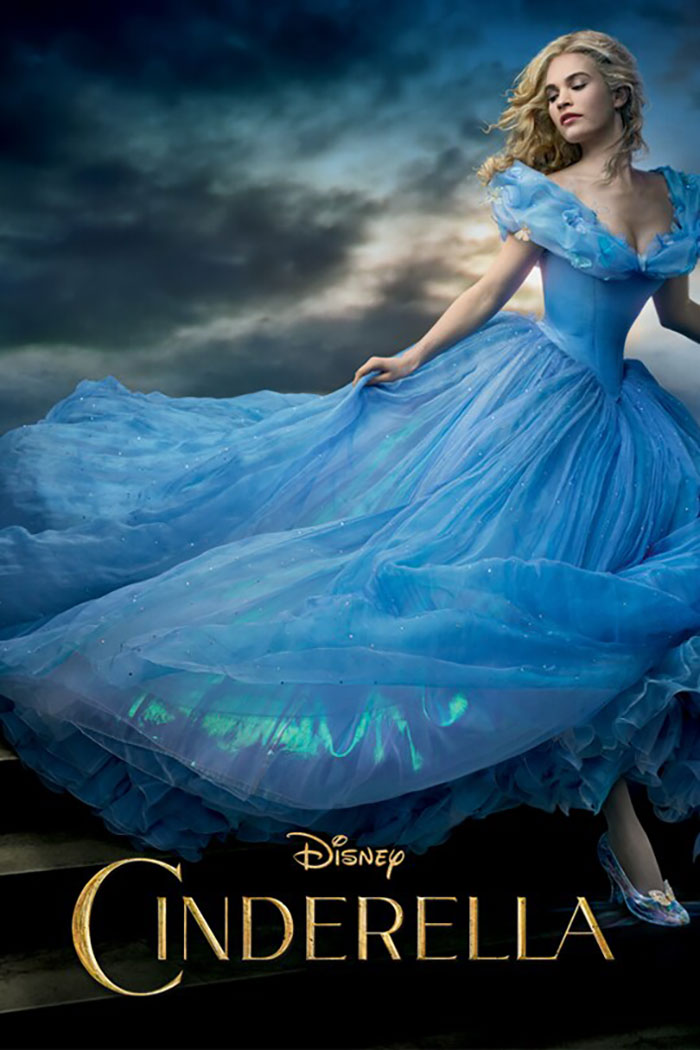 Cinderella in a flowing blue gown, representing Disney remakes and discussions on soulless adaptations and racism.