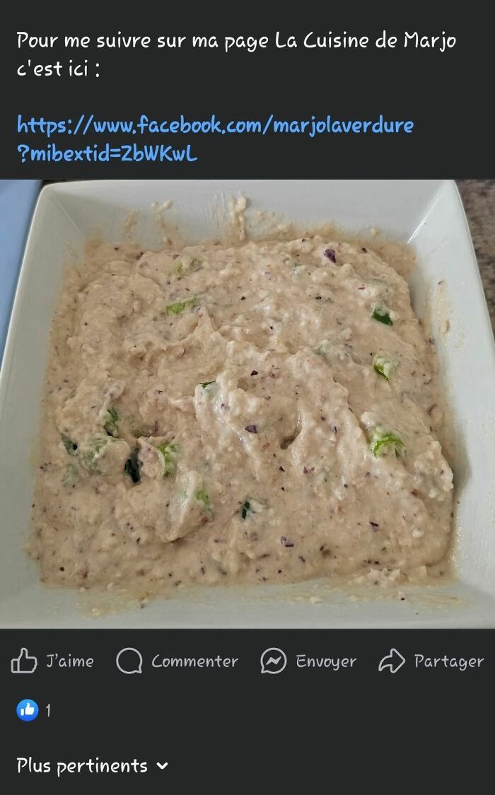 Thick, unappetizing food mash in a white square bowl with visible small vegetable pieces, a food pic to be shamed online.