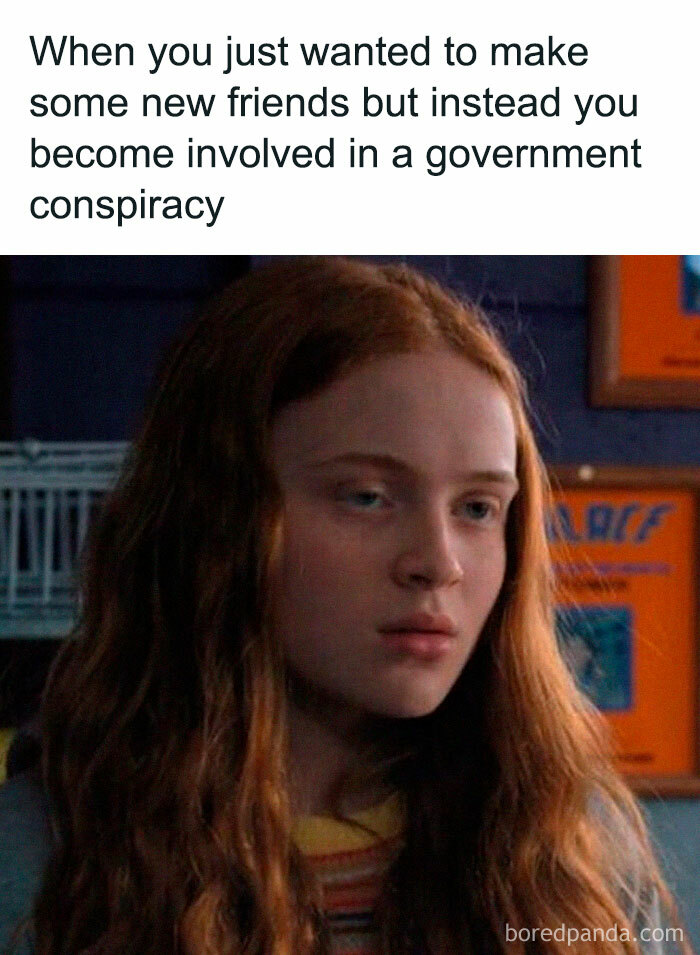 Teen girl with long red hair looking concerned with text about making friends and government conspiracy, funny Stranger Things memes.