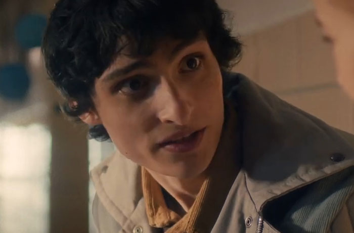 Young man from Stranger Things Season 5 scene, capturing reactions and funny comments from parents while watching the show.