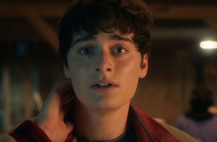 Young man watching Stranger Things season 5, capturing reactions to funniest things parents said during the show.