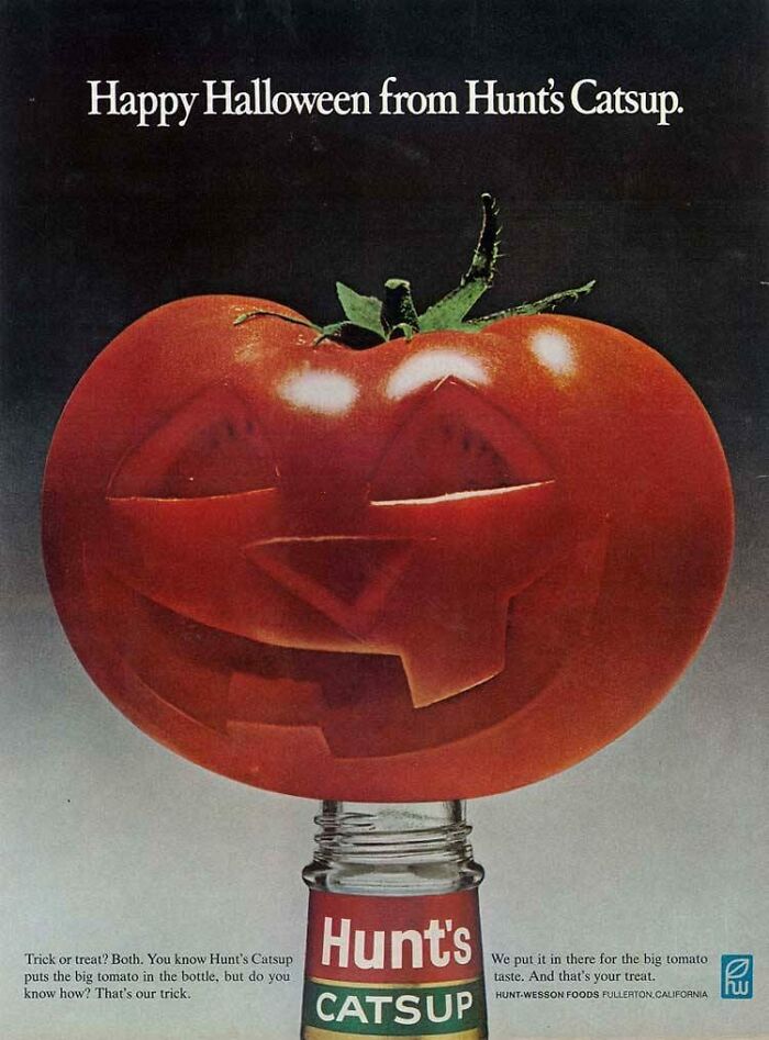 Vintage ad showing a Halloween jack-o'-lantern carved tomato atop a Hunt's Catsup bottle, illustrating past marketing.