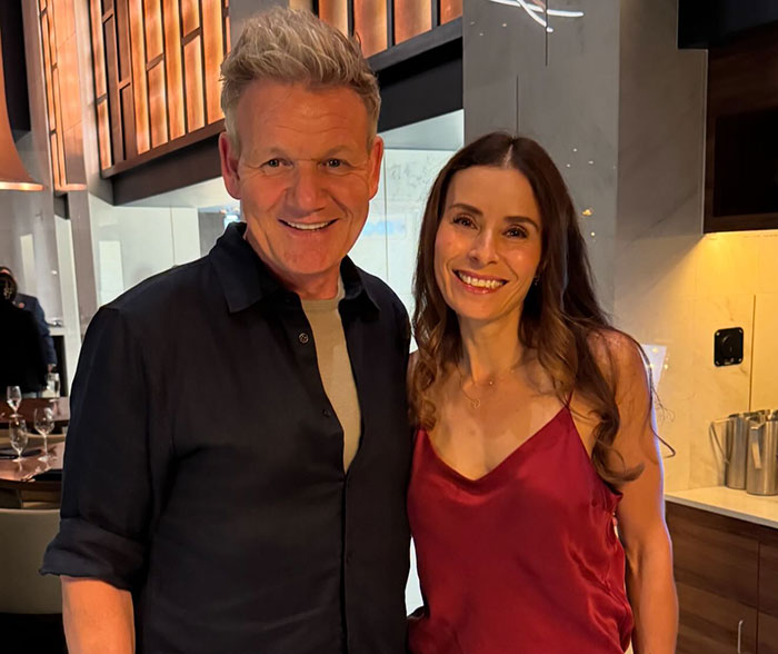 Gordon Ramsay smiling with daughter at wedding reception after aunt&rsquo;s controversial text about speech.