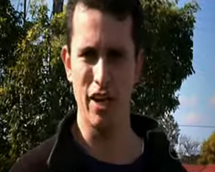 Man outdoors near trees and a blue sky, identified as the hero cop who stopped Bondi Beach attacker with a once-in-a-lifetime move