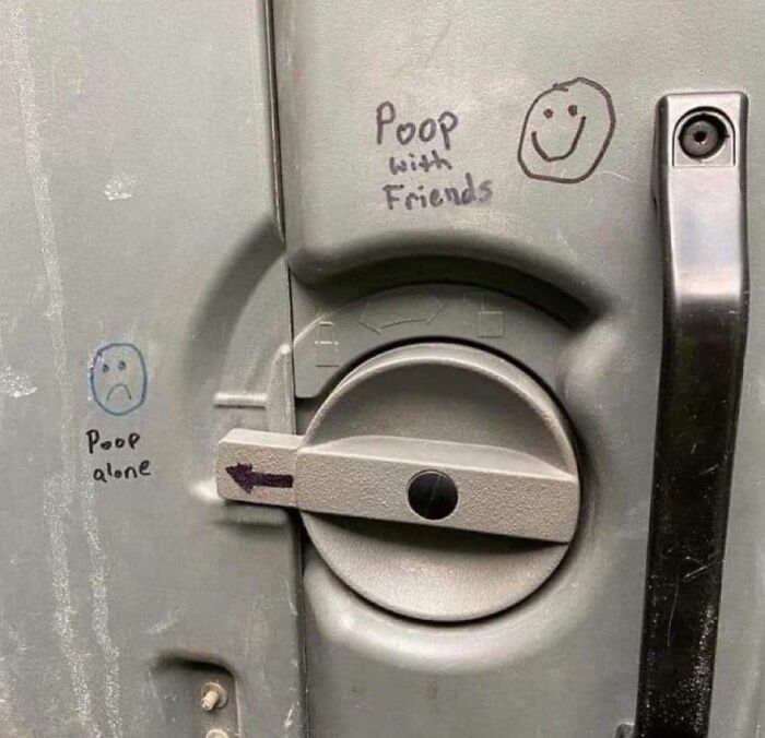 Graffiti on a bathroom door latch showing funny p**p alone and p**p with friends faces in a meme style.