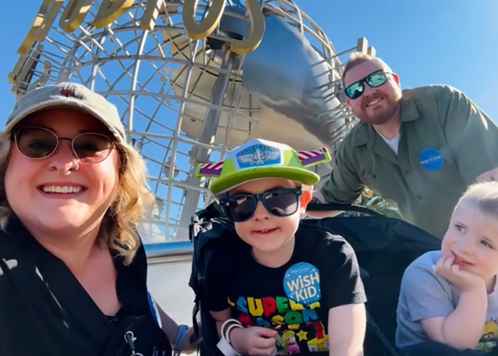 Family with terminally ill kids enjoying a day out, highlighting the mom involved in the Hilary Swank apology controversy.