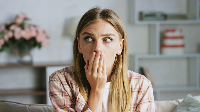 Woman looking shocked and confused after an unexpected love confession from FIL, feeling lost and uncertain.