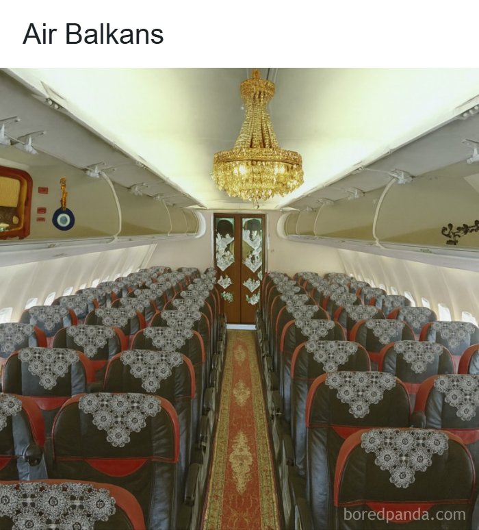 Airplane interior with lace seat covers and a chandelier, showcasing a humorous Eastern Europe themed design.