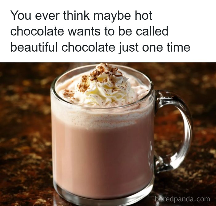 A clear glass mug of hot chocolate topped with whipped cream and cinnamon alongside a funny dad joke caption.
