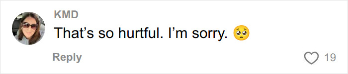 Comment expressing sympathy with text saying that something is hurtful and an apology, accompanied by a sad face emoji.