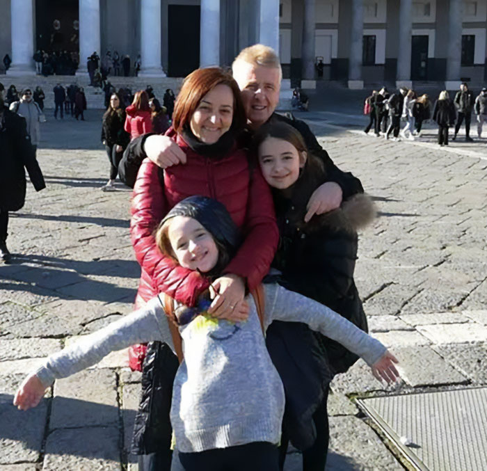 Italian mother and daughter with family in town, highlighting alert after fatal Christmas dinner incident.