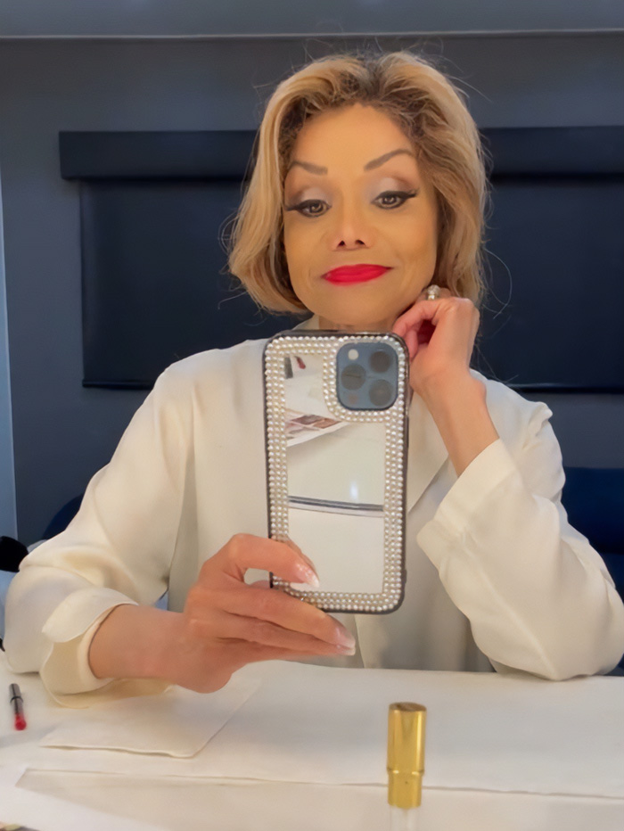 La Toya Jackson taking a selfie with alarmingly slim appearance, raising concern over possible health issues.