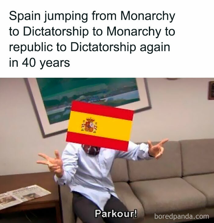 Person with Spain flag over face doing parkour on a couch, illustrating hilarious history memes about political changes.