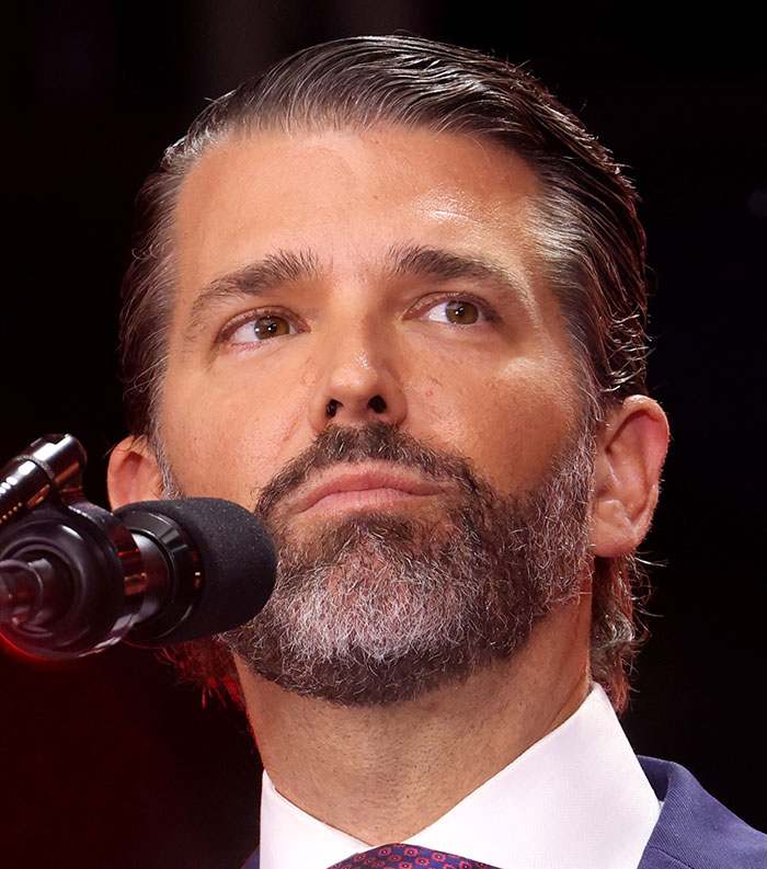Close-up of a man speaking into a microphone, related to the 50 most disliked stars of this year by popular vote.