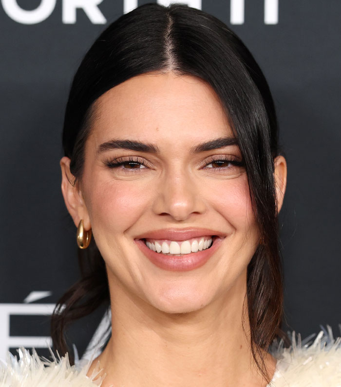 Close-up of a smiling woman, representing one of the 50 most disliked stars of this year voted by people.