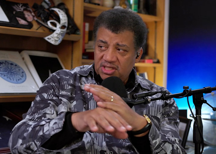 Neil deGrasse Tyson explaining the gender of Santa&rsquo;s reindeer Rudolph during a recorded discussion with a microphone.