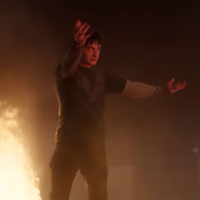 Noah Schnapp scene recreation from Stranger Things season with dramatic pose amid acting backlash and fiery background. Noah Schnapp scene recreation from Stranger Things season with dramatic pose amid acting backlash and fiery background.