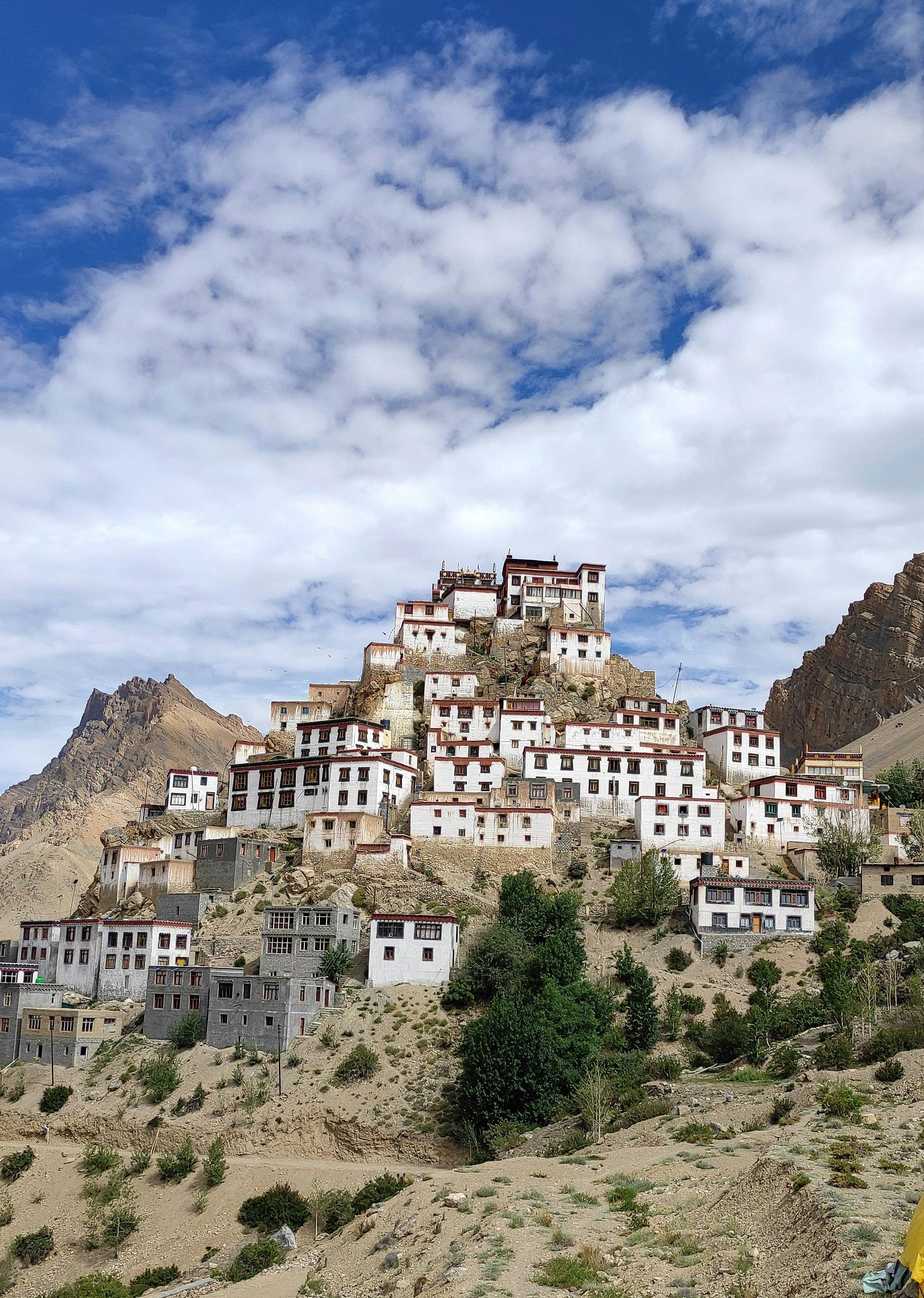Ancient monastery perched on rocky hills in Himachal Pradesh, surrounded by mountains and nature&rsquo;s finest wonders.