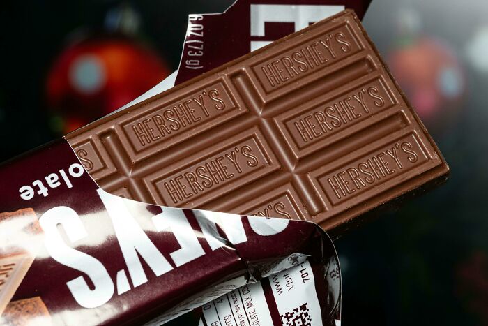 Close-up of unwrapped Hershey's chocolate bar, symbolizing unexpected wealth and times people became rich out of nowhere.