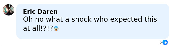 Comment by Eric Daren expressing shock with an emoji, reacting to a chilling toddler's foot appearing in photo beside Epstein.
