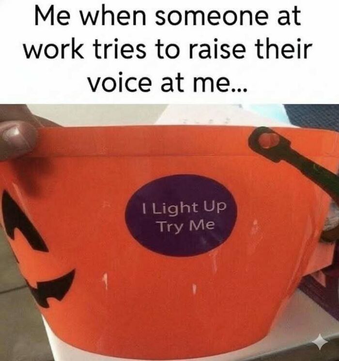 Funny work meme showing a Halloween bucket with a "I Light Up Try Me" sticker and a sarcastic caption about stress.