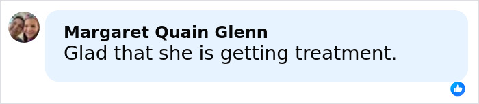 Two women smiling closely together, with a Facebook comment expressing relief about treatment for facial disfigurement.