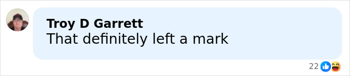 Screenshot of a social media comment saying "That definitely left a mark" reacting to Jake Paul's broken jaw incident.