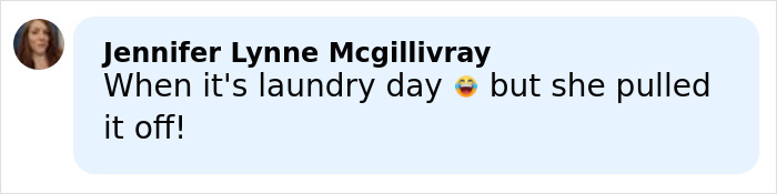 Brooks Nader wearing a Santa belt styled as a shirt at an outdoor winter event in Aspen with snow in the background