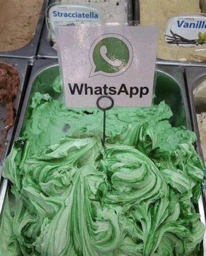 Green swirled ice cream labeled WhatsApp in an ice cream shop, a funny random pic that makes you laugh.