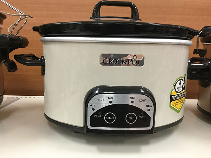 Crockpot slow cooker on a kitchen counter, a useful tool for easily saving money with poor person hacks.