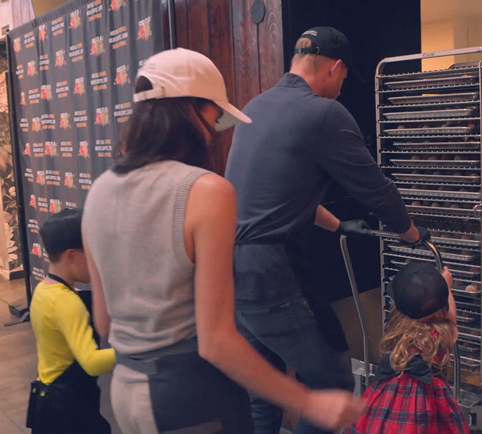 Prince Harry and Meghan Markle with their children in a candid holiday scene sparking fan discussions about manipulation.