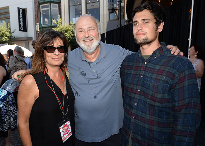 Rob Reiner with his eldest daughter and son at an outdoor event, capturing a family moment before controversy arose. Rob Reiner with his eldest daughter and son at an outdoor event, capturing a family moment before controversy arose.