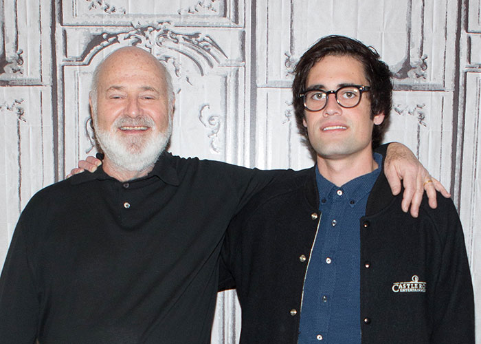 Rob Reiner with his son posing together, main person of interest in a grisly LA home investigation.