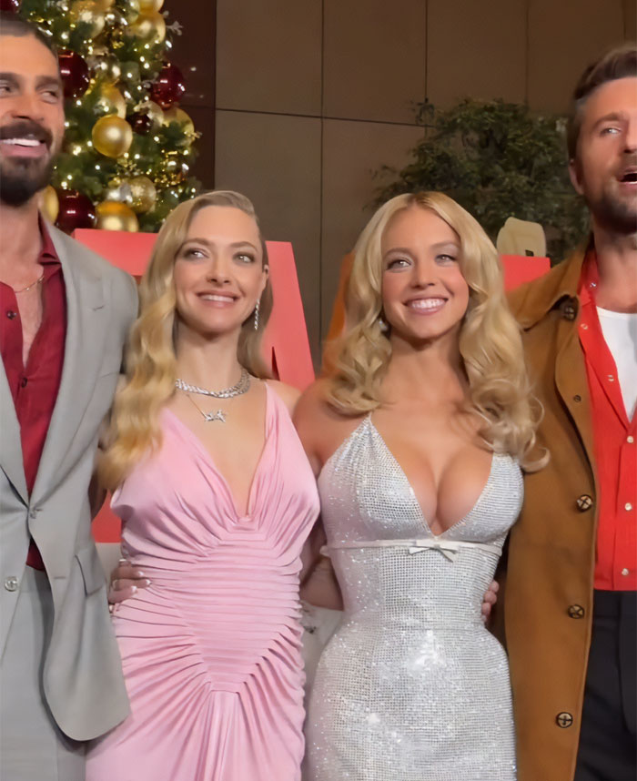 Sydney Sweeney and Amanda Seyfried at an event, sparking viral debate over media bias and racial double standards.