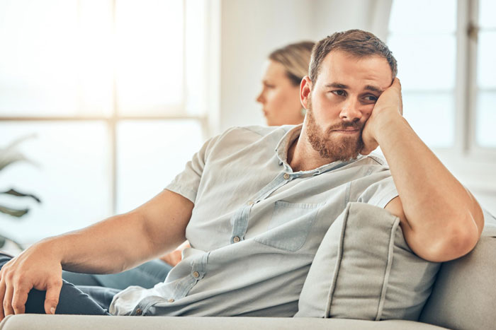 Son annoyed sitting at overflow table during Thanksgiving while parents let friends sit at main table at dinner