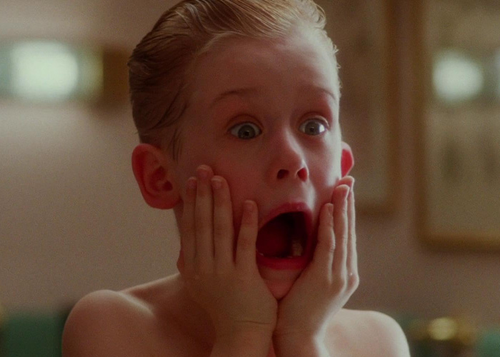 Young boy from Home Alone movie with a shocked expression holding his face, symbolizing viral millennials existential crisis. Young boy from Home Alone movie with a shocked expression holding his face, symbolizing viral millennials existential crisis.