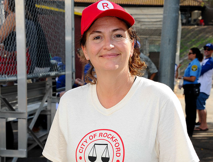 Rob Reiner’s eldest daughter wearing a red cap and white City of Rockford shirt at an outdoor event. Rob Reiner’s eldest daughter wearing a red cap and white City of Rockford shirt at an outdoor event.