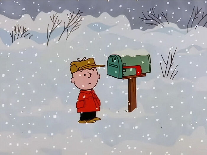 Child in a red jacket standing in snow by a mailbox during winter, illustrating a once-famous regular job scene.