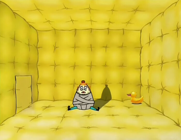 Cartoon character in a yellow padded room with a rubber duck, depicting family drama without intention humor.
