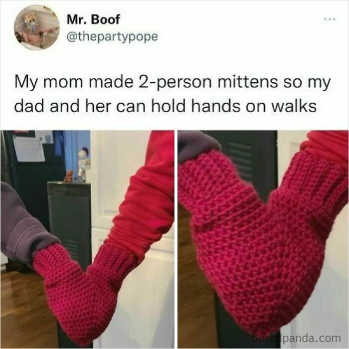 Two people wearing red 2-person mittens holding hands, a cheerful meme about cute couple accessories online.