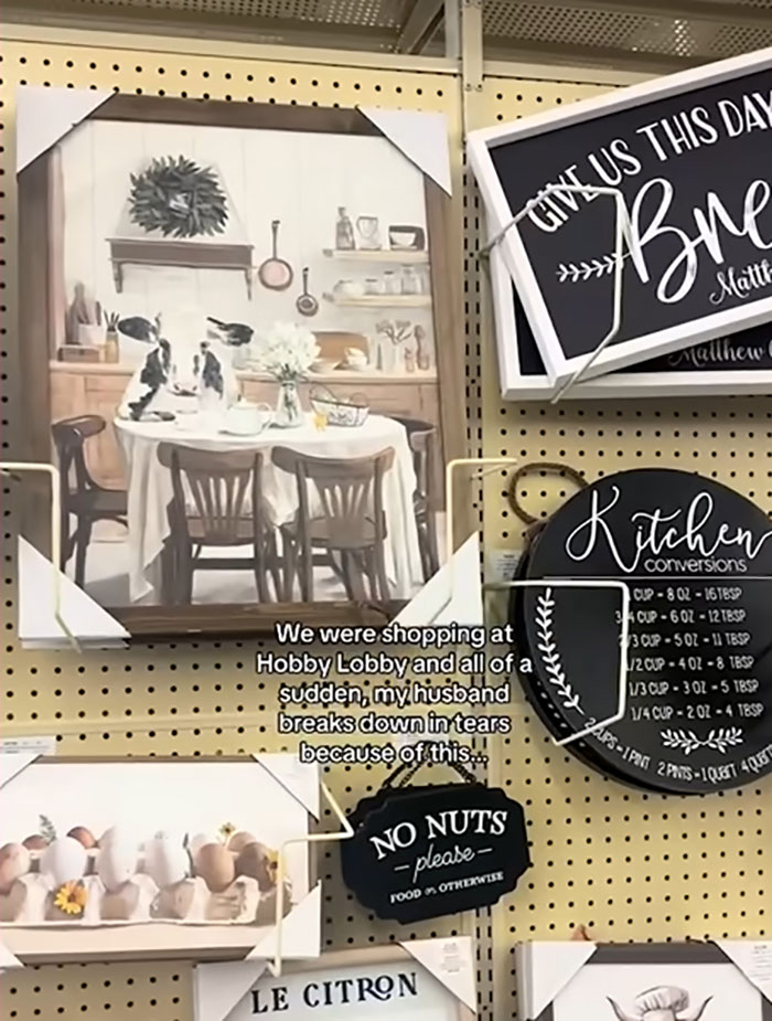 Wall display of home decor signs including a controversial sign that caused a brand mistake and led to boycott by customers.