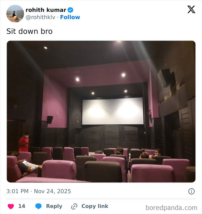 Small movie theater interior with purple and black seats, showcasing an example of the worst movie theaters shared by people.