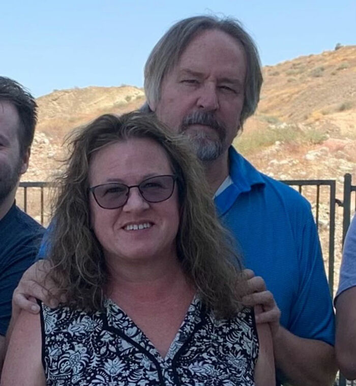 Group of people outdoors with a smiling woman, related to trans Muslim woman’s fate after skipping sentencing news. Group of people outdoors with a smiling woman, related to trans Muslim woman’s fate after skipping sentencing news.