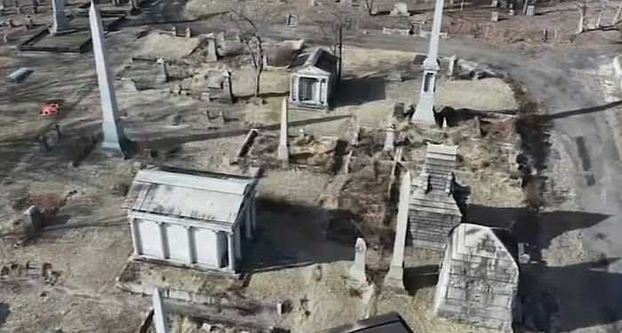 Aerial view of a chilling old cemetery near a house linked to a skull found in a man's car, prompting a horrifying discovery. Aerial view of a chilling old cemetery near a house linked to a skull found in a man's car, prompting a horrifying discovery.