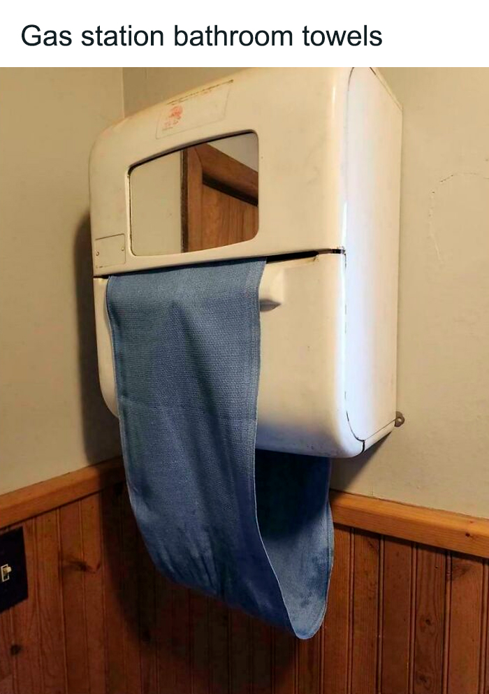 Vintage gas station bathroom towel dispenser with blue cloth towel, evoking nostalgia and making you feel old as heck.