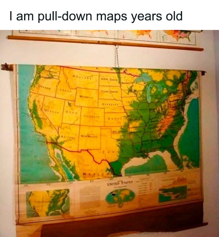 Pull-down vintage map of the United States hanging on a wall, a nostalgic item to make you feel old as heck.