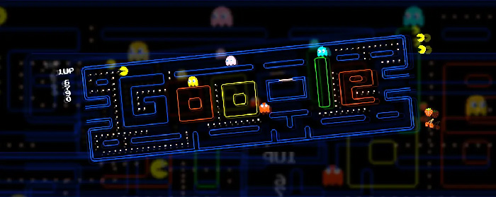 Pac-Man style Google Doodle game screen showing iconic maze and colorful ghosts for popular Google Doodle games.